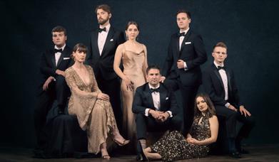 Vocal ensemble VOCES8 posing in black tie attire
