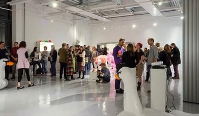 Visitors exploring the gallery