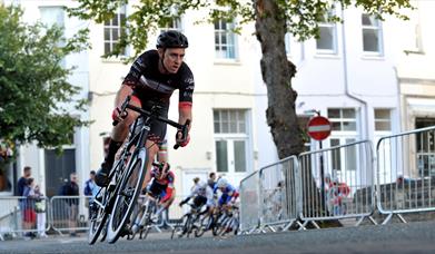A man riding a bike in Cheltenham
