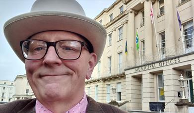 Alan Jones in front of Cheltenham Municipal Offices