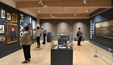 Patrons enjoying the Wilson Art Gallery displays