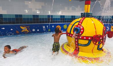 Children playing at the Splash Pad