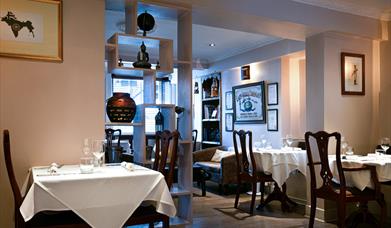 Interior tables and chairs at East India Cafe