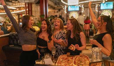 People playing social darts at Flight Club