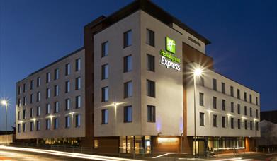 Exterior of Holiday Inn Express in the evening