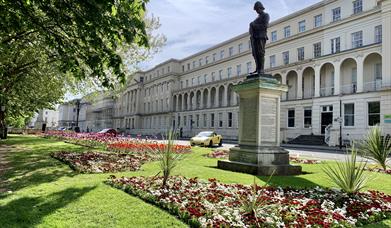Municipal building and the Long Gardens, Cheltenham. Statue shows Edward Wilson, local hero