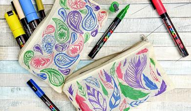 Pencil case full of pens