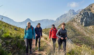 Group of people hiking in the hills